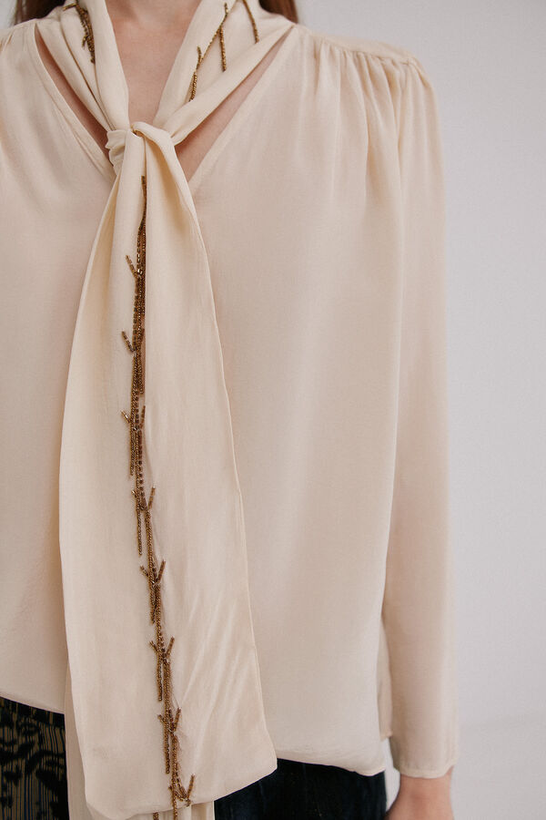 Hoss Intropia Carrie. Blusa con lazada Marfil