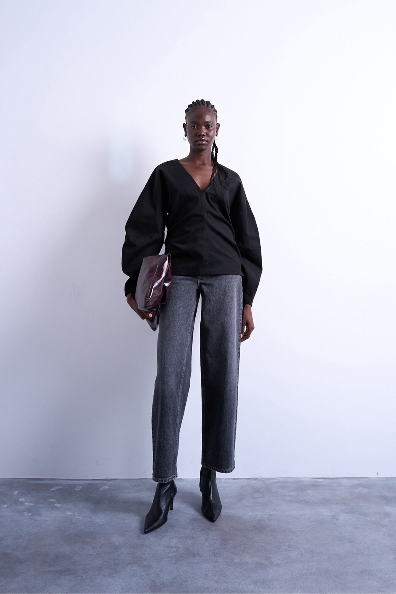 Topshop Jeans wide fit de tiro bajo con cintur&oacute;n trasero