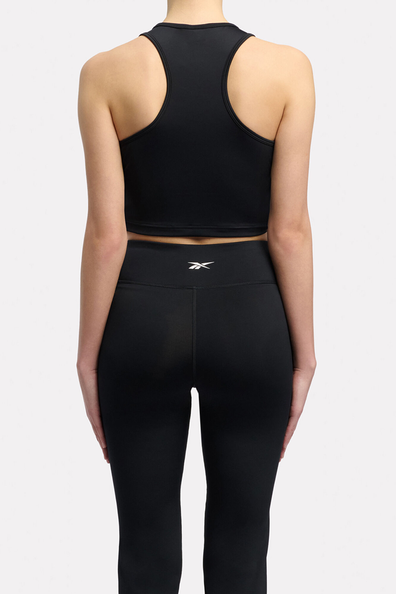 Reebok Camiseta deportiva corta sin mangas Reebok