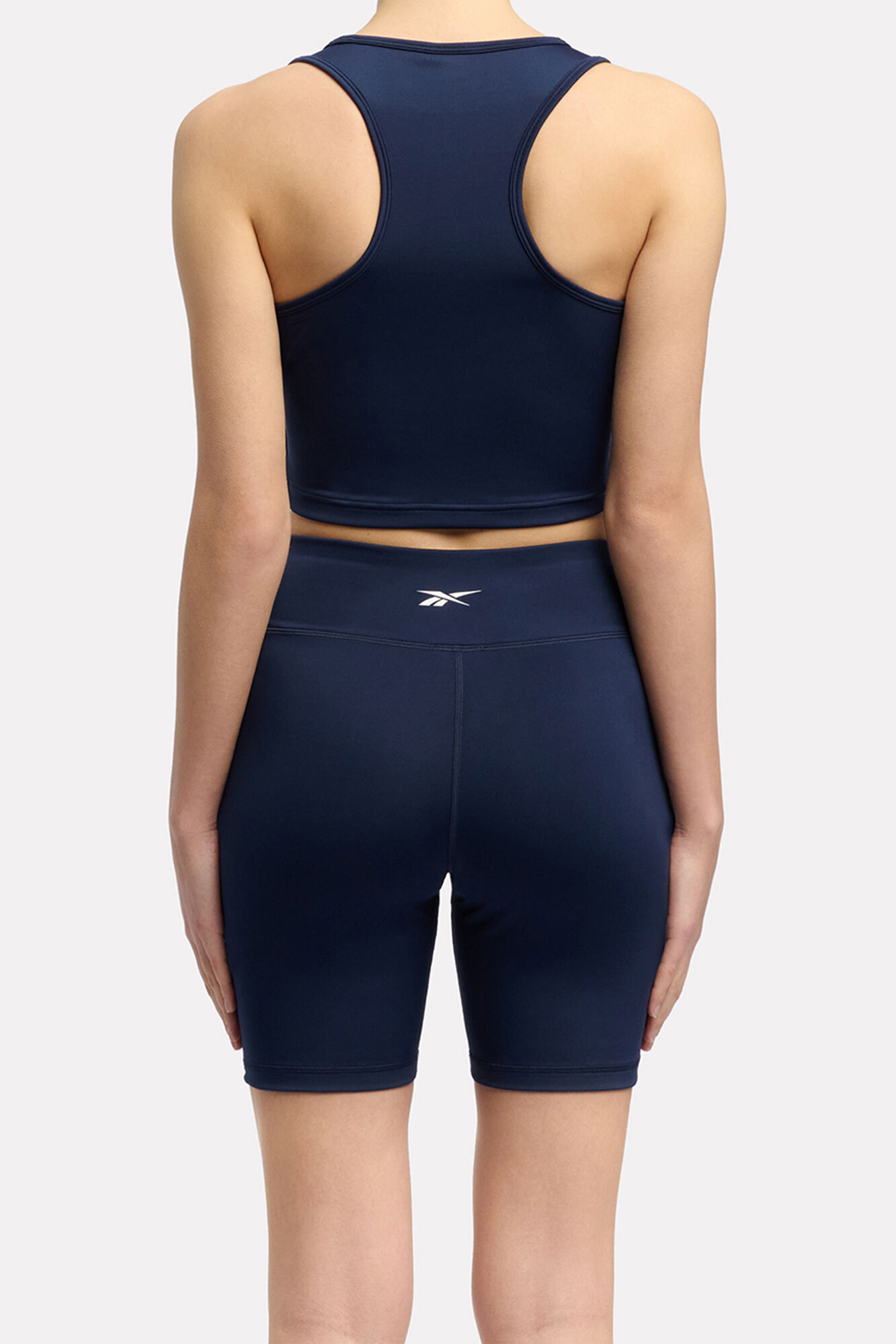 Reebok Camiseta deportiva corta sin mangas Reebok