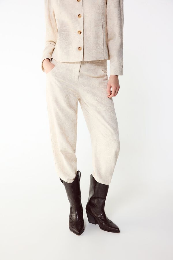 Conjunto de pantal&oacute;n, chaqueta y bota