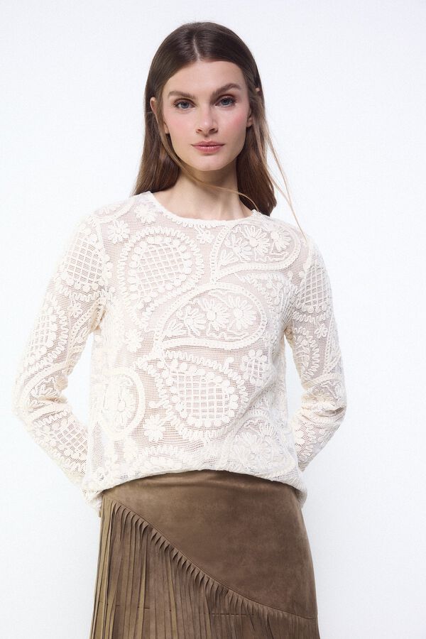 Conjunto de falda, cazadora, bota y top