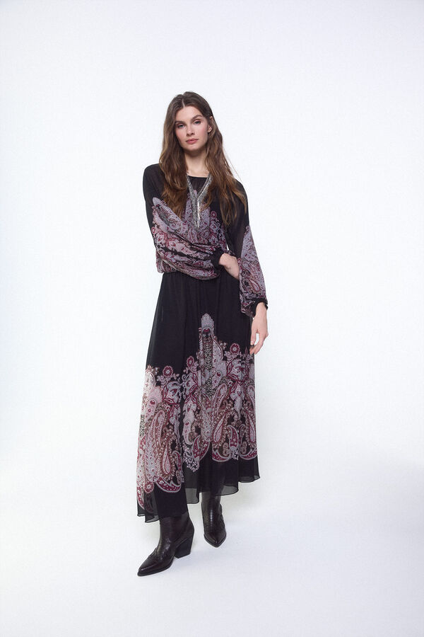 Conjunto de falda, bota y blusa