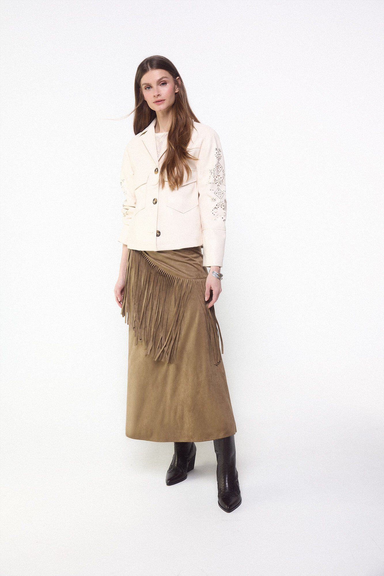 Conjunto de falda, cazadora, bota y top